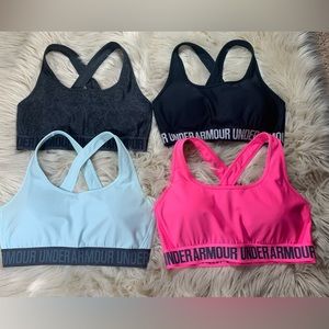 4 women Under Armour Sport bras